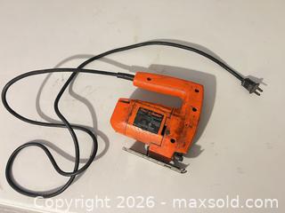 MaxSold Auction: Black & Decker Orange Corded Jig Saw 120V - Hamilton (Ontario, Canada) SELLER MANAGED Downsizing Online Auction - Bobalink Road.