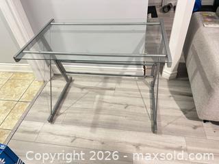 MaxSold Auction: Glass Top Computer Desk with Silver Metal Frame - Hamilton (Ontario, Canada) SELLER MANAGED Downsizing Online Auction - Bobalink Road.