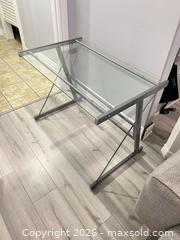 MaxSold Auction: Glass Top Computer Desk with Silver Metal Frame - Hamilton (Ontario, Canada) SELLER MANAGED Downsizing Online Auction - Bobalink Road.