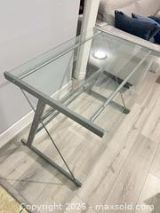 MaxSold Auction: Glass Top Computer Desk with Silver Metal Frame - Hamilton (Ontario, Canada) SELLER MANAGED Downsizing Online Auction - Bobalink Road.
