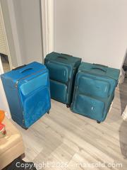 MaxSold Auction: Lot of 3–4+ Large Soft-Sided Spinner Suitcases & Duffels - Hamilton (Ontario, Canada) SELLER MANAGED Downsizing Online Auction - Bobalink Road.