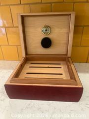 MaxSold Auction: Ciga Humidor, Small Resin Composite Planter and wallets - Bakersfield (California, USA) PARTNER MANAGED Moving Online Auction - Grecian Laurel Drive