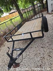 MaxSold Auction: 12 ft x 6'8" Single-Axle Utility Trailer, Black Frame - Lakeland (Florida, USA) PARTNER MANAGED Downsizing Online Auction - Shore Acres Drive