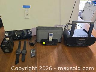 MaxSold Auction: Mixed Audio Gear: Sony Boombox, iPod Dock, Logic3 Speakers + Smartwatches - Lakeland (Florida, USA) PARTNER MANAGED Downsizing Online Auction - Shore Acres Drive