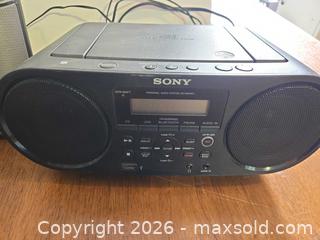 MaxSold Auction: Mixed Audio Gear: Sony Boombox, iPod Dock, Logic3 Speakers + Smartwatches - Lakeland (Florida, USA) PARTNER MANAGED Downsizing Online Auction - Shore Acres Drive