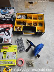 MaxSold Auction: Mixed Tools & Hardware Lot with Heat Tool, Laser Level, Charger - Lakeland (Florida, USA) PARTNER MANAGED Downsizing Online Auction - Shore Acres Drive