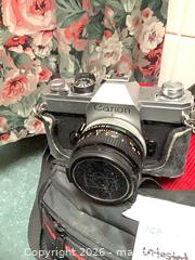 MaxSold Auction: Canon FTb 35mm Film SLR with 50mm Prime Lens - Carson (California, USA) PARTNER MANAGED Estate Sale Online Auction -  South Perry Street