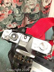 MaxSold Auction: Canon FTb 35mm Film SLR with 50mm Prime Lens - Carson (California, USA) PARTNER MANAGED Estate Sale Online Auction -  South Perry Street