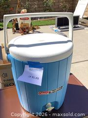 MaxSold Auction: Coleman Metal Chest Cooler & Roundabout Water Jug Cooler - Carson (California, USA) PARTNER MANAGED Estate Sale Online Auction -  South Perry Street