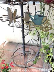 MaxSold Auction: Wrought Iron Metal Plant Stand with Shelves & Hanging Accent - Carson (California, USA) PARTNER MANAGED Estate Sale Online Auction -  South Perry Street