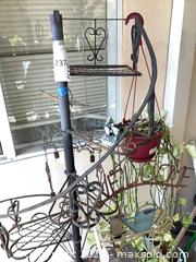 MaxSold Auction: Wrought Iron Metal Plant Stand with Shelves & Hanging Accent - Carson (California, USA) PARTNER MANAGED Estate Sale Online Auction -  South Perry Street