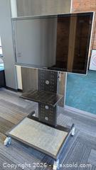 MaxSold Auction: Rolling TV cart with TV - Victoria (British Columbia, Canada) SELLER MANAGED Commercial Liquidation Online Auction - Bastion Square