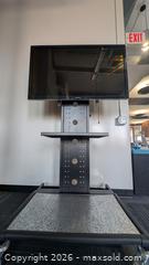 MaxSold Auction: Rolling TV cart with TV - Victoria (British Columbia, Canada) SELLER MANAGED Commercial Liquidation Online Auction - Bastion Square