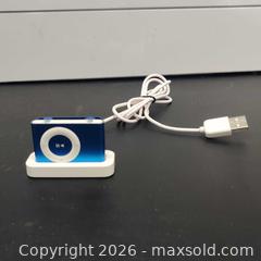 MaxSold Auction: 4th gen Blue Apple iPod Shuffle with Charging Base - Toronto (Ontario, Canada) SELLER MANAGED Downsizing Online Auction - Metropolitan Road (STORAGE)