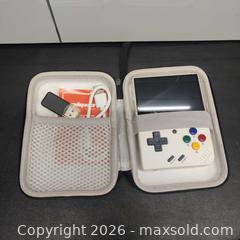 MaxSold Auction: Hand Held Gaming Device - Toronto (Ontario, Canada) SELLER MANAGED Downsizing Online Auction - Metropolitan Road (STORAGE)