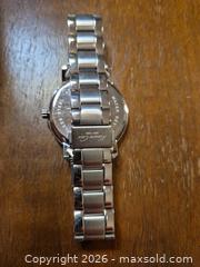 MaxSold Auction: Kenneth Cole Stainless Steel Quartz Wristwatch - Black Dial - Ottawa (Ontario, Canada) SELLER MANAGED Downsizing Online Auction - St.-Denis Street