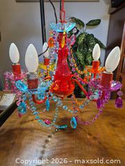 MaxSold Auction: Multicolor Five-Arm Chandelier and IKEA Blue Star Night Light - Ottawa (Ontario, Canada) SELLER MANAGED Downsizing Online Auction - St.-Denis Street