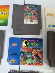 MaxSold Auction: Lot of (4) NES Nintendo Games & 3 Booklets - Rush (New York, USA) PARTNER MANAGED Estate Sale Online Auction - Honeoye Falls Five Points Road.