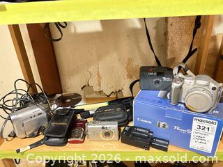 MaxSold Auction: Digital Cameras, Camcorder, Accessories and Tripod - Toronto (Ontario, Canada) PARTNER MANAGED Estate Sale Online Auction - Coxwell Avenue