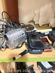 MaxSold Auction: Digital Cameras, Camcorder, Accessories and Tripod - Toronto (Ontario, Canada) PARTNER MANAGED Estate Sale Online Auction - Coxwell Avenue