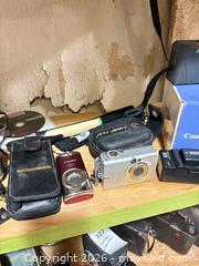 MaxSold Auction: Digital Cameras, Camcorder, Accessories and Tripod - Toronto (Ontario, Canada) PARTNER MANAGED Estate Sale Online Auction - Coxwell Avenue