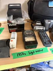 MaxSold Auction: Mixed Camera Gear: Sony Mirrorless, Lenses, Vivitar Flash, Meter - Toronto (Ontario, Canada) PARTNER MANAGED Estate Sale Online Auction - Coxwell Avenue