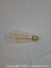 MaxSold Auction: 12 Vintage Edison ST64 Amber 60W Bulbs, E26 Base - Brantford (Ontario, Canada) SELLER MANAGED Downsizing Online Auction - Kitchener Avenue