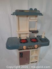 MaxSold Auction: Plastic Play Kitchen with Electronic Burners and Faucet - Brantford (Ontario, Canada) SELLER MANAGED Downsizing Online Auction - Kitchener Avenue