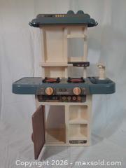 MaxSold Auction: Plastic Play Kitchen with Electronic Burners and Faucet - Brantford (Ontario, Canada) SELLER MANAGED Downsizing Online Auction - Kitchener Avenue