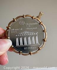 MaxSold Auction: 1976 Montreal Olympic $10 Coin, Coin Necklace Pendant and Assorted International Coins - Oakville (Ontario, Canada) PARTNER MANAGED Estate Sale Online Auction - Caulder Drive
