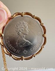 MaxSold Auction: 1976 Montreal Olympic $10 Coin, Coin Necklace Pendant and Assorted International Coins - Oakville (Ontario, Canada) PARTNER MANAGED Estate Sale Online Auction - Caulder Drive