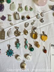 MaxSold Auction: Pendants, Rings & Ring Holder - Oakville (Ontario, Canada) PARTNER MANAGED Estate Sale Online Auction - Caulder Drive