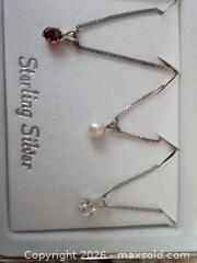 MaxSold Auction: Genuine garnet, freshwater pearl, and cubi zirconia sterling silver gift set  - San Jose (California, USA) SELLER MANAGED Moving Online Auction - Villa Avenue