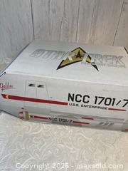 MaxSold Auction:  First Star Trek Mission Crate, a themed subscription box from Loot Crate  - Rochester (New York, USA) SELLER MANAGED Reseller Online Auction - Mendota Drive 