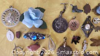MaxSold Auction: Lot of vintage charms, brooches etc. - Saanich (British Columbia, Canada) SELLER MANAGED Downsizing Online Auction - Tall Tree Place