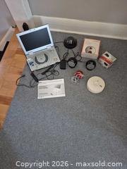 MaxSold Auction: Mixed Electronics Lot: Portable DVD, Speakers, Cameras, Alarm - Ottawa (Ontario, Canada) SELLER MANAGED Downsizing Online Auction - Westhaven Crescent