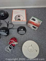 MaxSold Auction: Mixed Electronics Lot: Portable DVD, Speakers, Cameras, Alarm - Ottawa (Ontario, Canada) SELLER MANAGED Downsizing Online Auction - Westhaven Crescent