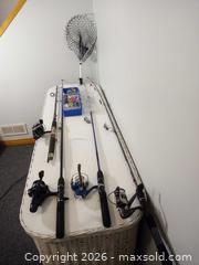 MaxSold Auction: Lot of Fishing Rods, Reels, Tackle Box, and Landing Net - Ottawa (Ontario, Canada) SELLER MANAGED Moving Online Auction - Des Épinettes Avenue