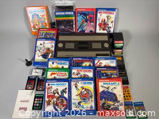 MaxSold Auction: Vintage MATTEL ELECTRONIC INTELLIVISION Model 2609 Console, Switch Box, and Games  - Toronto (Ontario, Canada) SELLER MANAGED Reseller Online Auction - Chesswood Drive