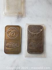 MaxSold Auction: Coca-Cola 1901-1976 75th Anniversary Commemorative Bars, Pair - Decatur (Georgia, USA) SELLER MANAGED Reseller Online Auction - North Druid Hills Road (STORAGE)