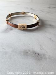 MaxSold Auction: Tory Burch Logo Leather Bracelet with Gold-Tone Accents - Decatur (Georgia, USA) SELLER MANAGED Reseller Online Auction - North Druid Hills Road (STORAGE)