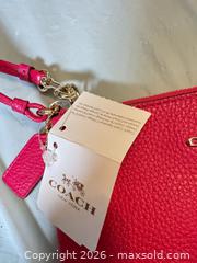 MaxSold Auction: Coach New York Corner Zip Wristlet – Pink Ruby Pebbled Leather, Gold Hardware, NWT - Toronto (Ontario, Canada) SELLER MANAGED Moving Online Auction - Howard Park Avenue