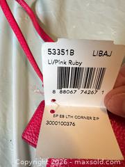 MaxSold Auction: Coach New York Corner Zip Wristlet – Pink Ruby Pebbled Leather, Gold Hardware, NWT - Toronto (Ontario, Canada) SELLER MANAGED Moving Online Auction - Howard Park Avenue