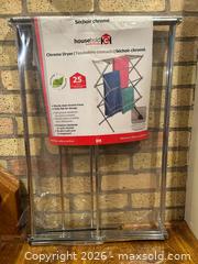 MaxSold Auction: Household Storage & Organization Lot – Black Resin Shelving, Chrome Drying Rack & Wall Hoo - Toronto (Ontario, Canada) SELLER MANAGED Moving Online Auction - Howard Park Avenue
