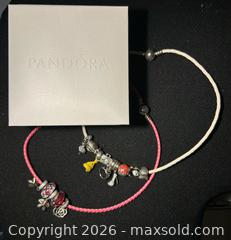 MaxSold Auction: Pandora Leather necklaces Lot – 2 necklaces with Charms | White & Pink Braided Leather, S92 - Toronto (Ontario, Canada) SELLER MANAGED Moving Online Auction - Howard Park Avenue
