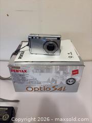 MaxSold Auction: Digital & Film Point 'n Shoot Cameras with Accessories: Pentax, Lumix, Olympus - New Westminster (British Columbia, Canada) PARTNER MANAGED Estate Sale Online Auction - Chestnut Street