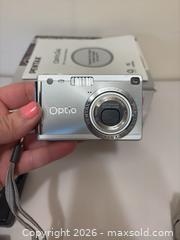 MaxSold Auction: Digital & Film Point 'n Shoot Cameras with Accessories: Pentax, Lumix, Olympus - New Westminster (British Columbia, Canada) PARTNER MANAGED Estate Sale Online Auction - Chestnut Street