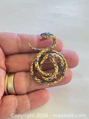 MaxSold Auction: MCM Arthur Pepper (ART) Coiled Snake Brooch with Enamel & Rhinestone Details - New Westminster (British Columbia, Canada) PARTNER MANAGED Estate Sale Online Auction - Chestnut Street