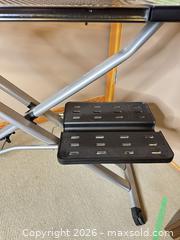 MaxSold Auction: Rowenta Ironing Board, 60 in x 18 in, Height Adjustable - West Vancouver (British Columbia, Canada) SELLER MANAGED Downsizing Online Auction - 17th Street (CONDO)