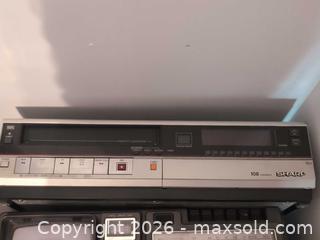 MaxSold Auction: Amstrad PPC640 Portable Computer, Sharp VHS Player, Singer Carmate 3300 and Radio- TV  Player B - Toronto (Ontario, Canada) Downsizing Online Auction - Bonacres Avenue